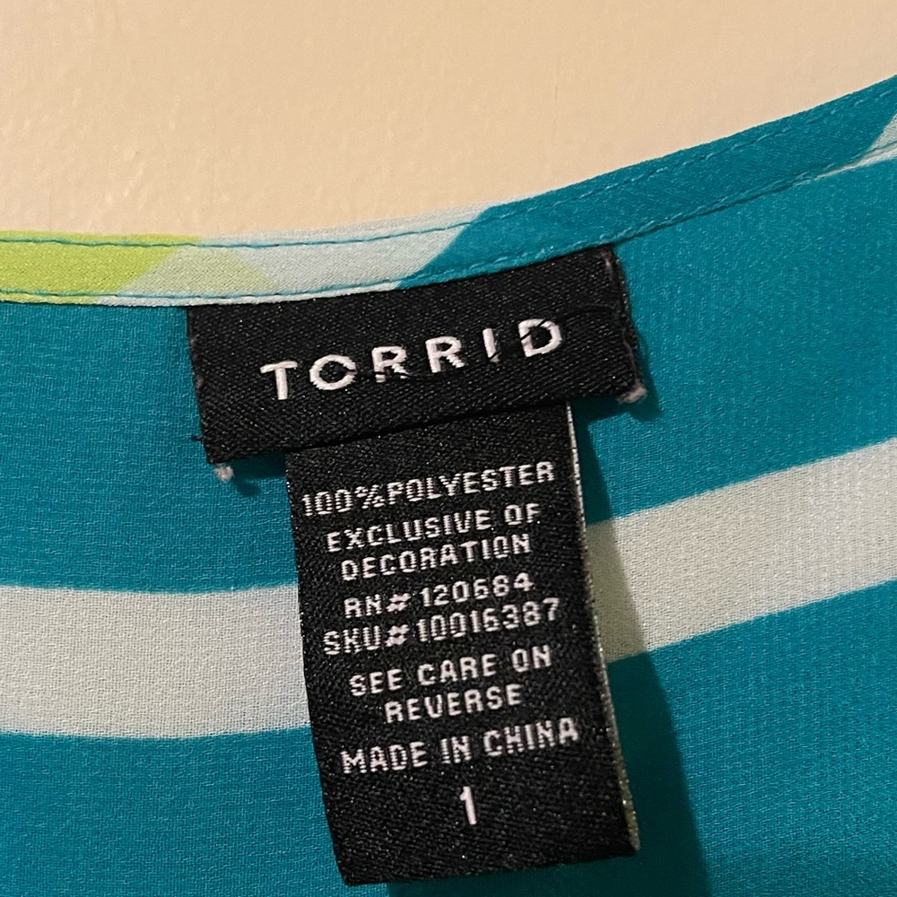Colorful Torrid tank. Size 1. Good condition. Sheer fabric. 100% polyester - Picture 2 of 3